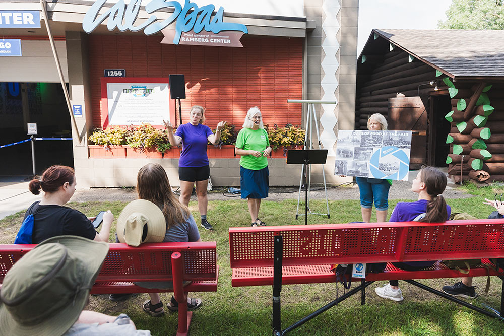 An ASL interpreter working at the Minnesota State Fair Foundation History Snapshot presentation.