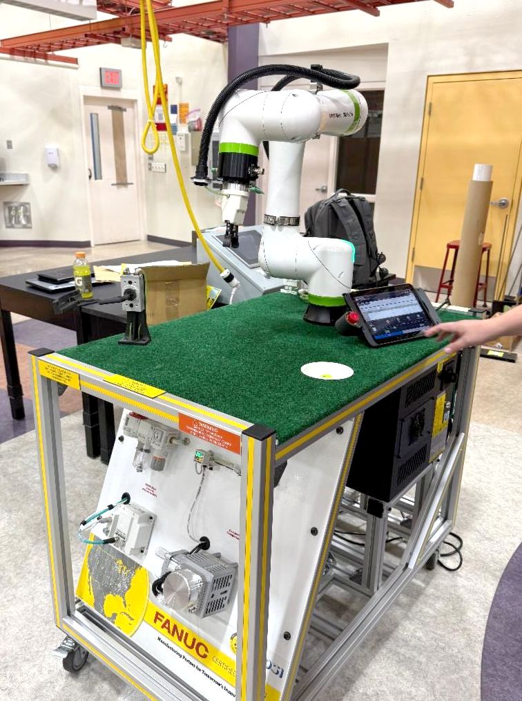 A robotic arm in w work lab