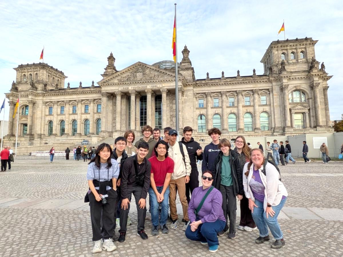 Students pose in front of a government building in Germany