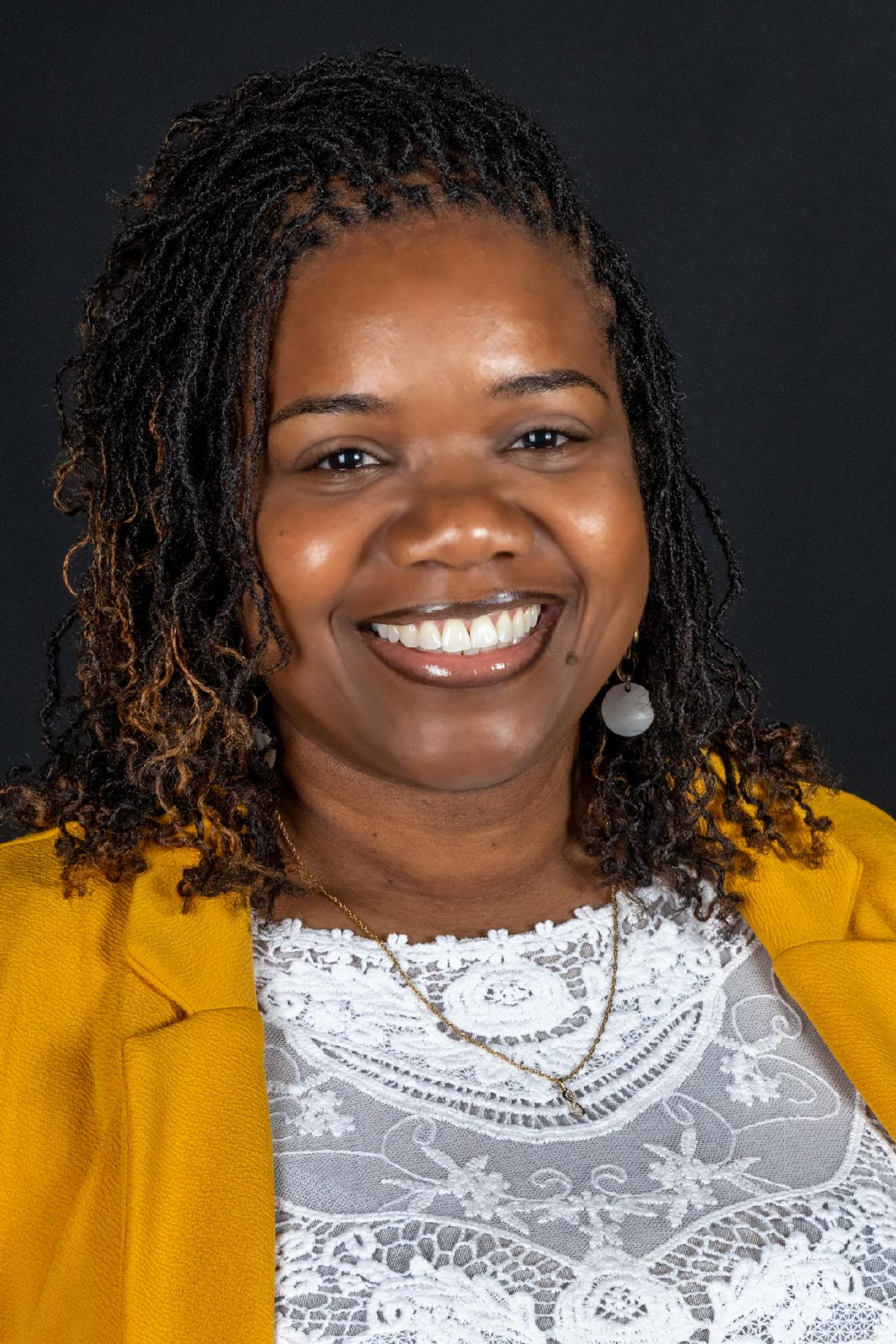 Staff headshot of Dr. Kristi Kelly