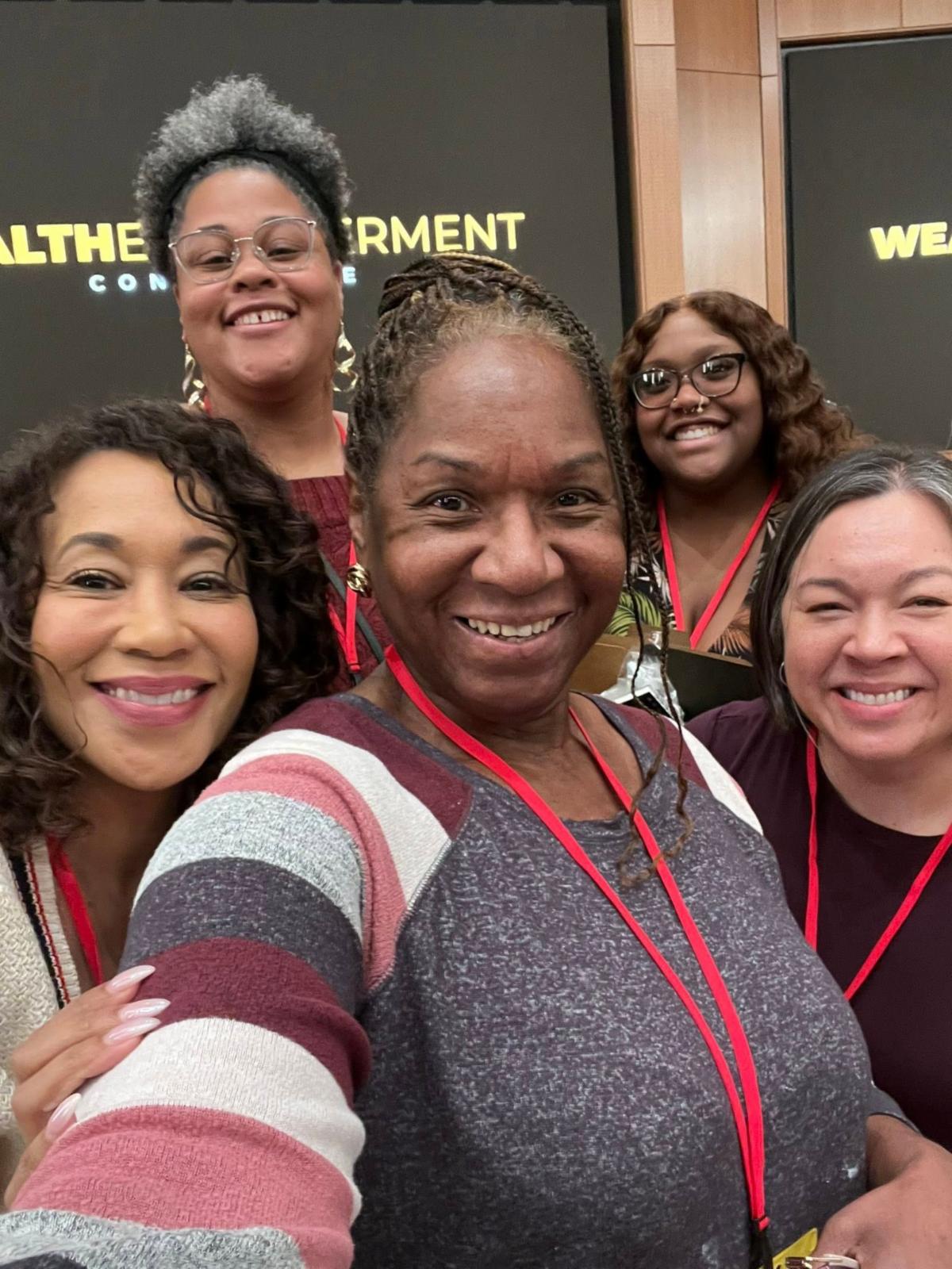 Sharon Johnson pictured with friends at the Wealth Empowerment Conference in Madison, Wisconsin