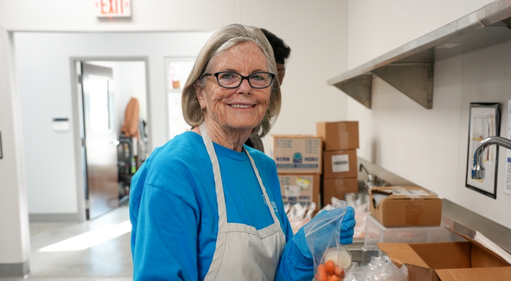 Becky always wears a smile when she’s volunteering with the kitchen team.