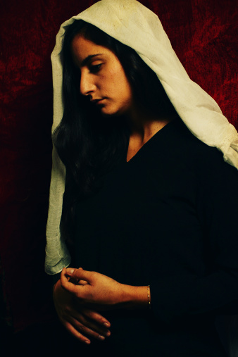 paining of Jesus mother Mary with dark hair olive skin