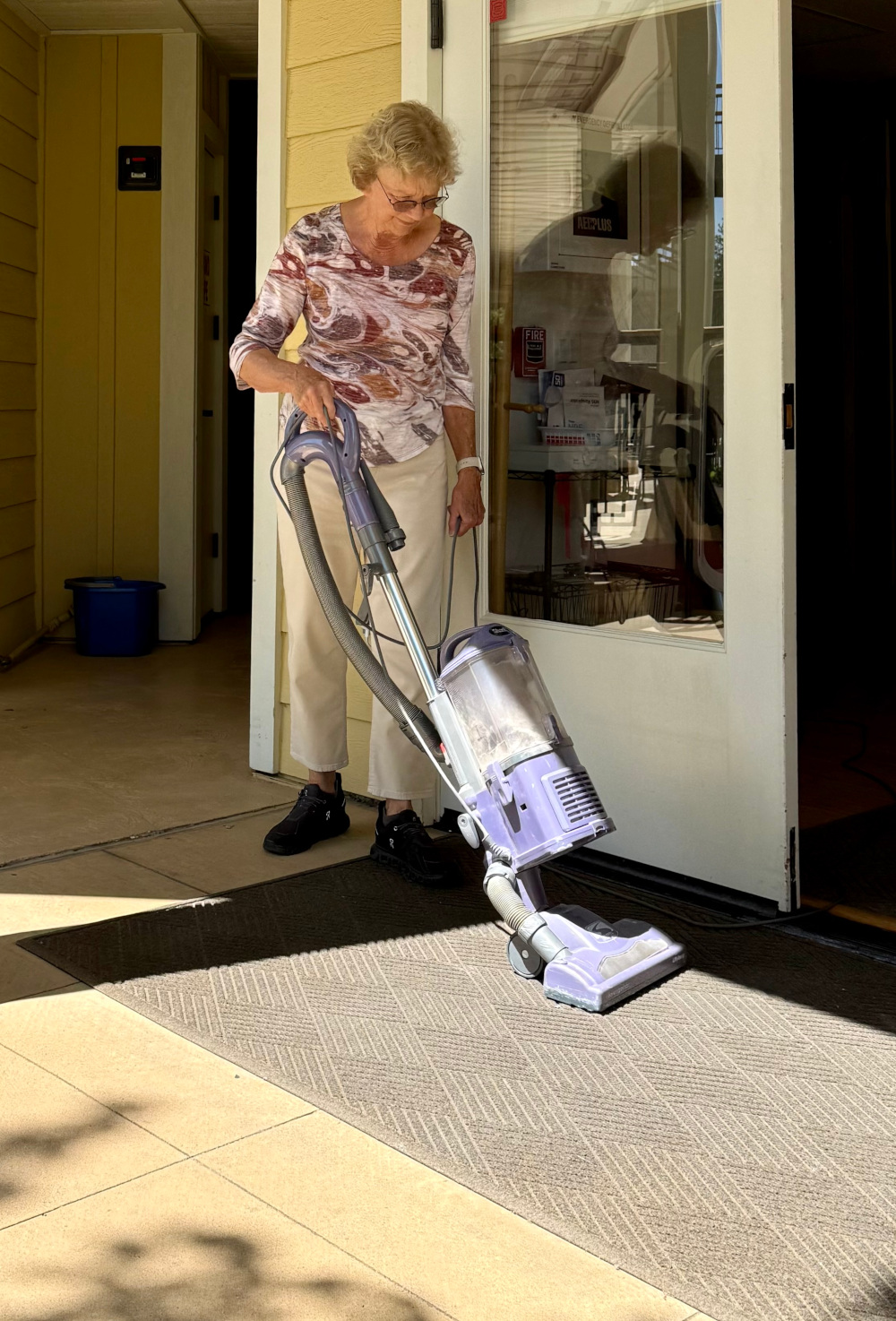 Gayle vacuuming