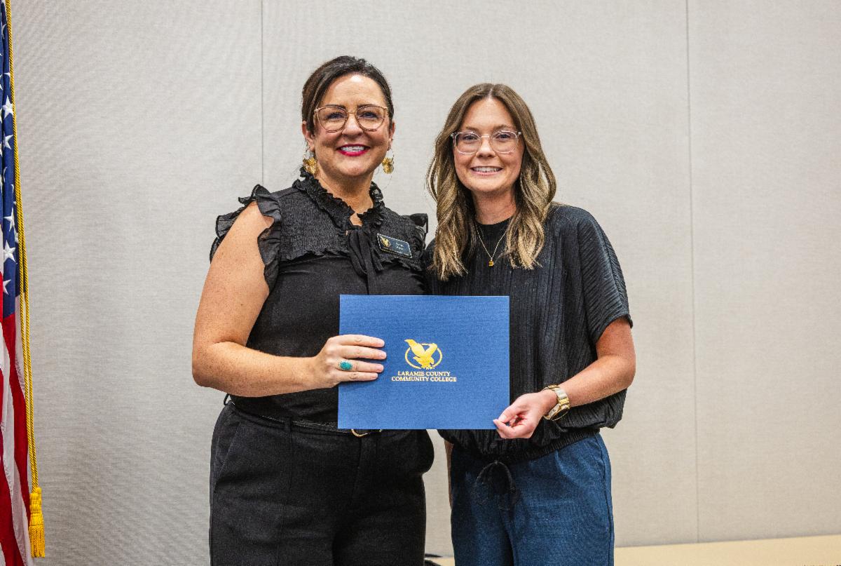 Image of Meg Meredith receiving her Certified Public Manager Certificate at the graduation ceremony