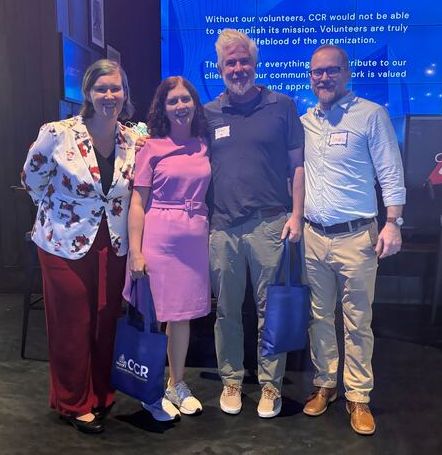 1.	CCR_s Deputy Executive Director Whitney Trumble and volunteers Ron Gieseke and Gail Rubin Dallas enjoy the evening