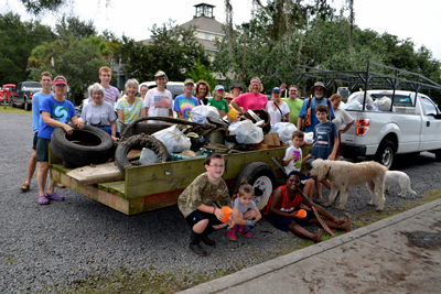 Volunteers with debris from Jeremy Creek in McClellanville