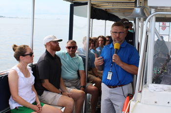 Students on a boat touring Charleston Harbor
