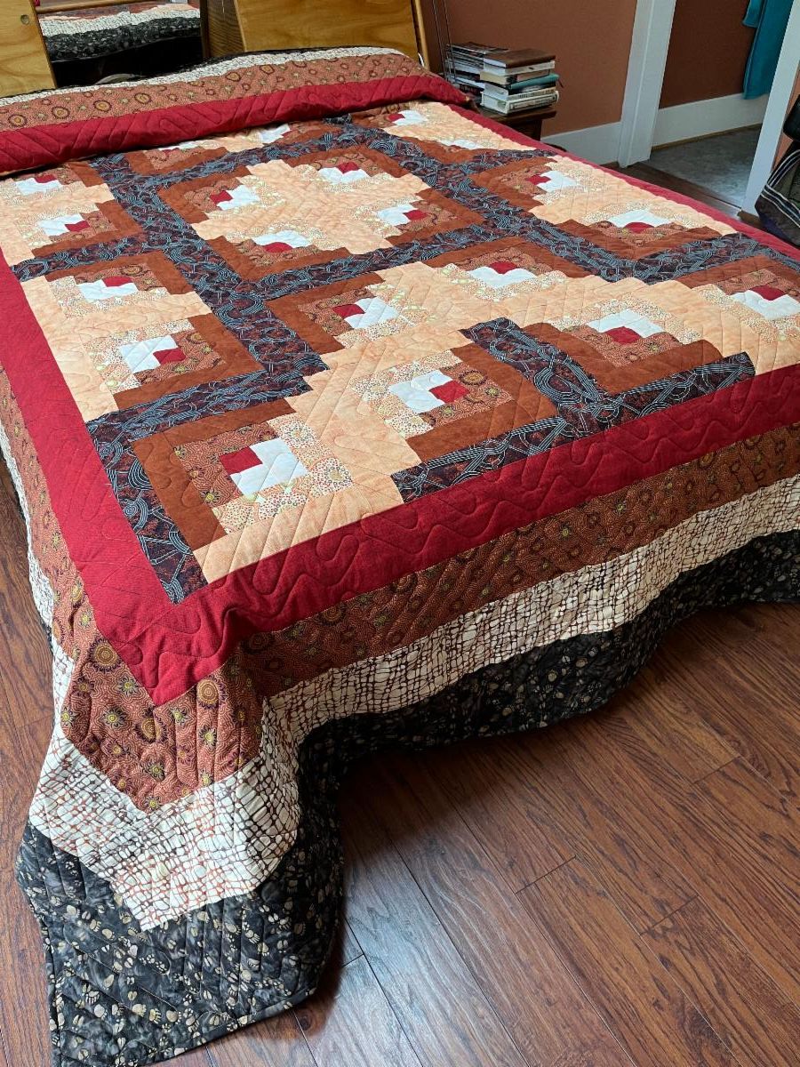 Kim's Log Cabin quilt made with Australian Aboriginal fabrics