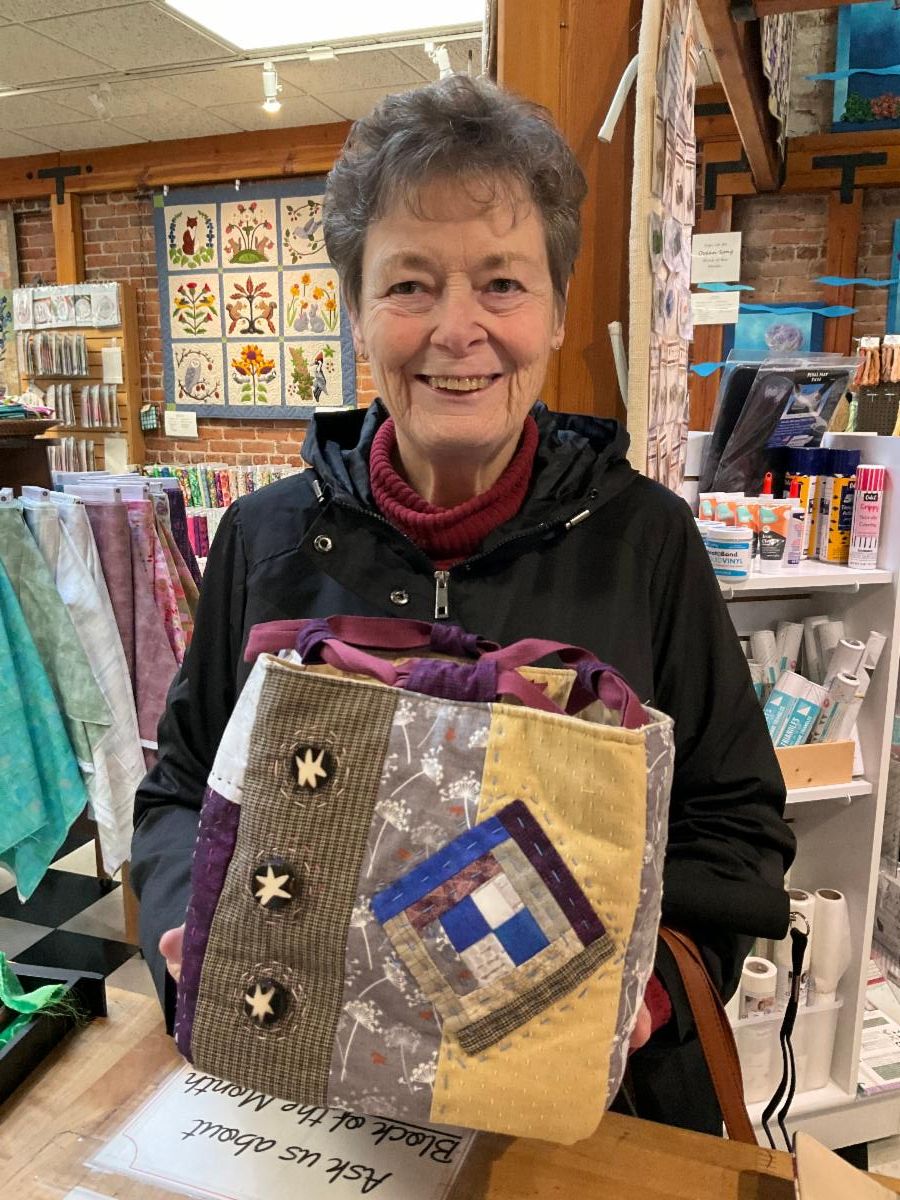 Customer holding a handmade patchwork Rice Bag