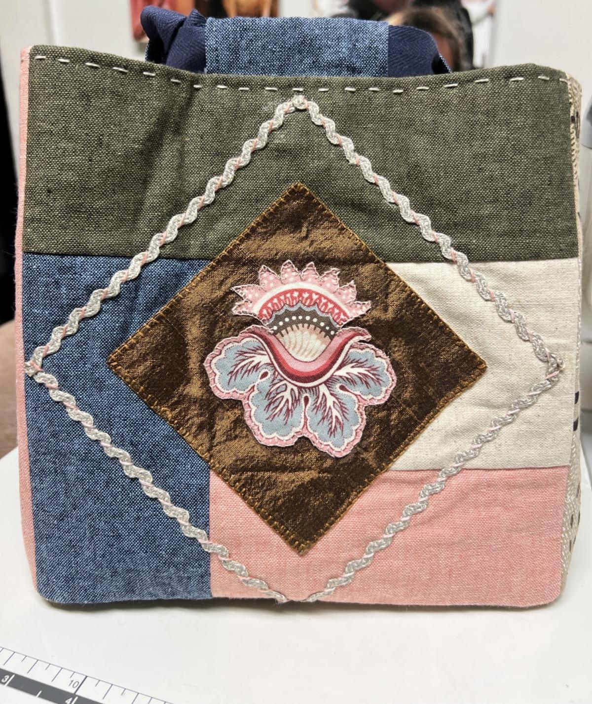 Rice Bag decorated with floral appliqué