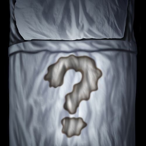 Bed wetting problem or bedwetting questions as a fluid stain on a mattress shaped as a question mark as a medical bladder health icon or psychological issue during sleep in a 3D illustration style.