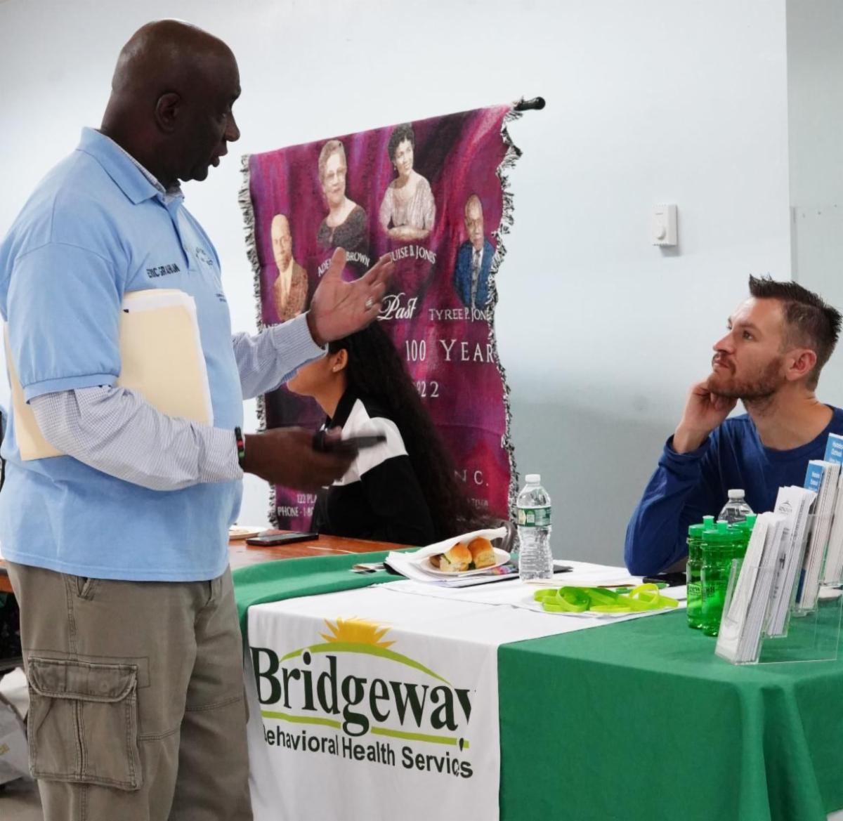 JHG Community Info Fair - Eric Graham interacting with organizations