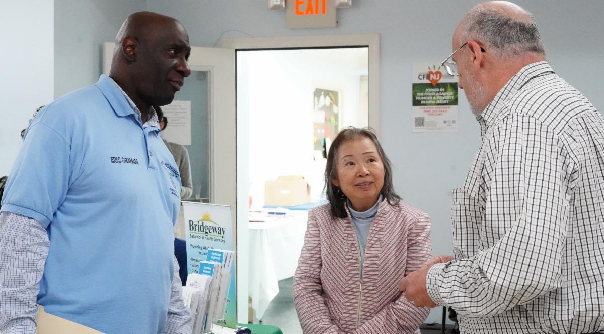 JHG Community Info Fair - Eric Graham interacting with residents and organizations