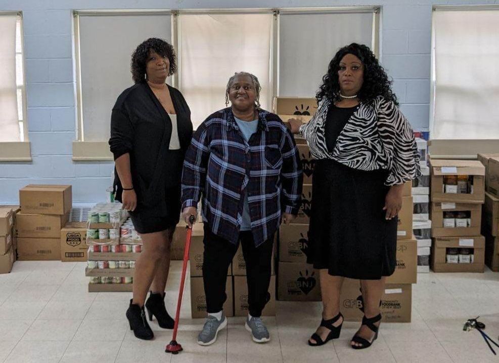 Left to Right  Manager Renada Smith Logistical Coordinator Rose Diggs JHG Resident Association President  Avonell BergenPhillips