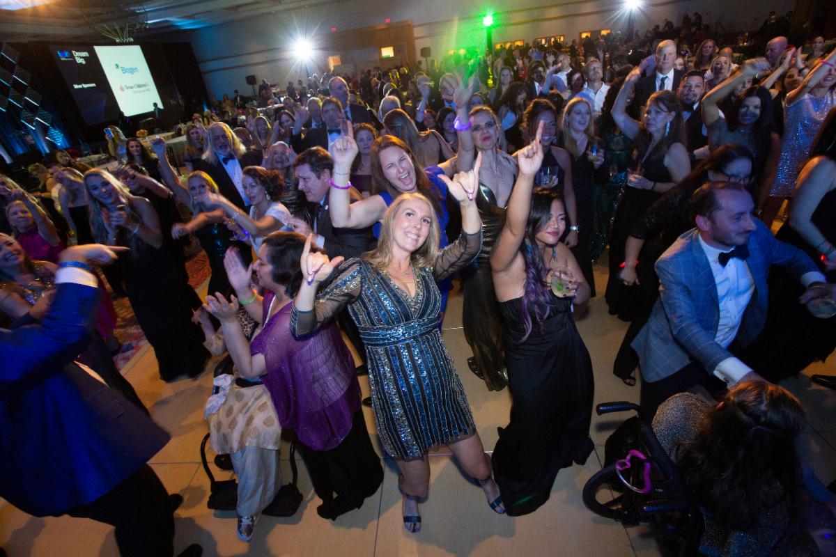 Attendees dancing at the Gala