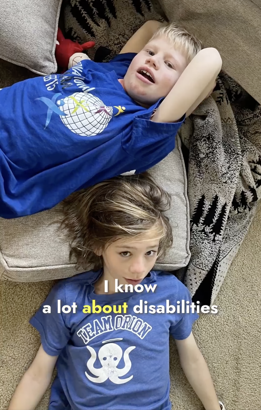 Screenshot from Micah's Video featuring Orion and Micah: "I know a lot about disabilities"