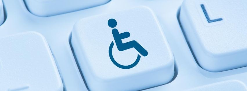 Computer keyboard with accessibility symbol on a key