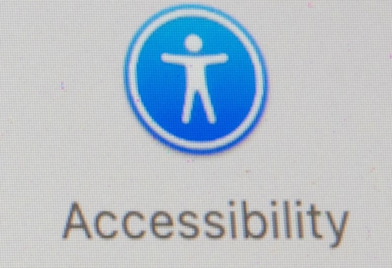 Blue circle with standing stick figure icon inside. Accessibility is typed underneath.