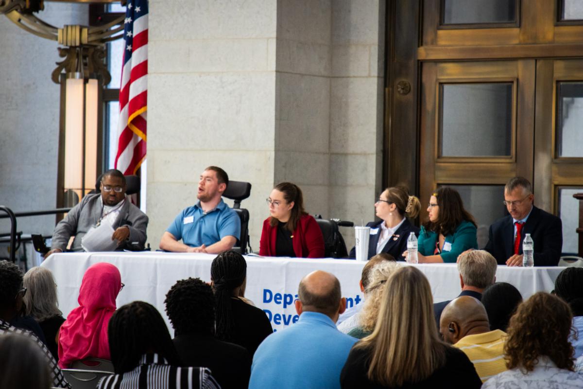 image of county board members with lived experience participating on a panel