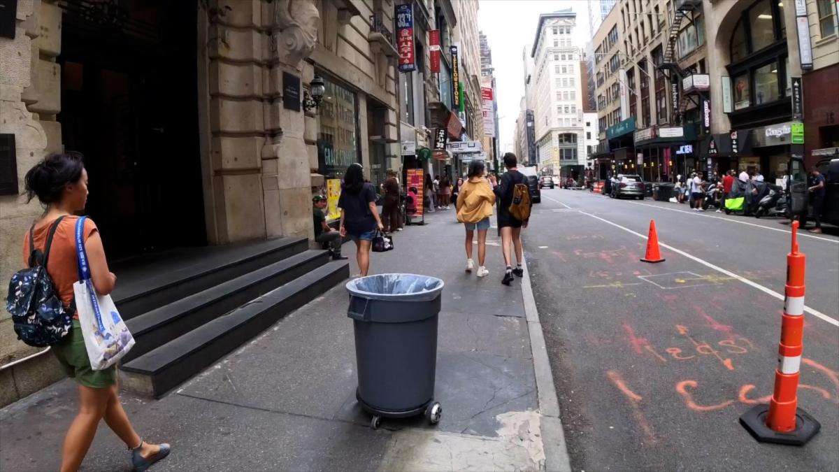 A color photo showing "trashbot" navigating NYC