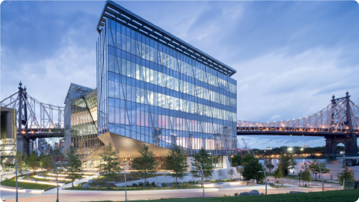A color photo showing the Cornell Tech campus at dusk.