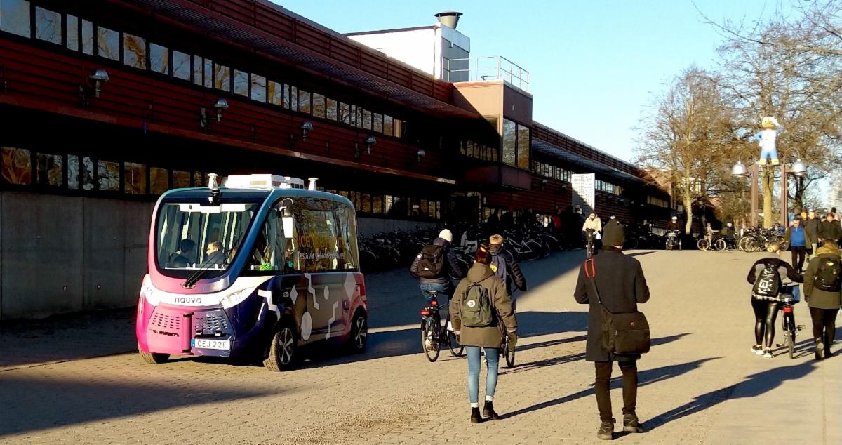 A color photo of an autonomous bus Caption: Autonomous buses in Linköping in Sweden must make frequent stops when pedestrians and cyclists get too close. Credit: Provided
