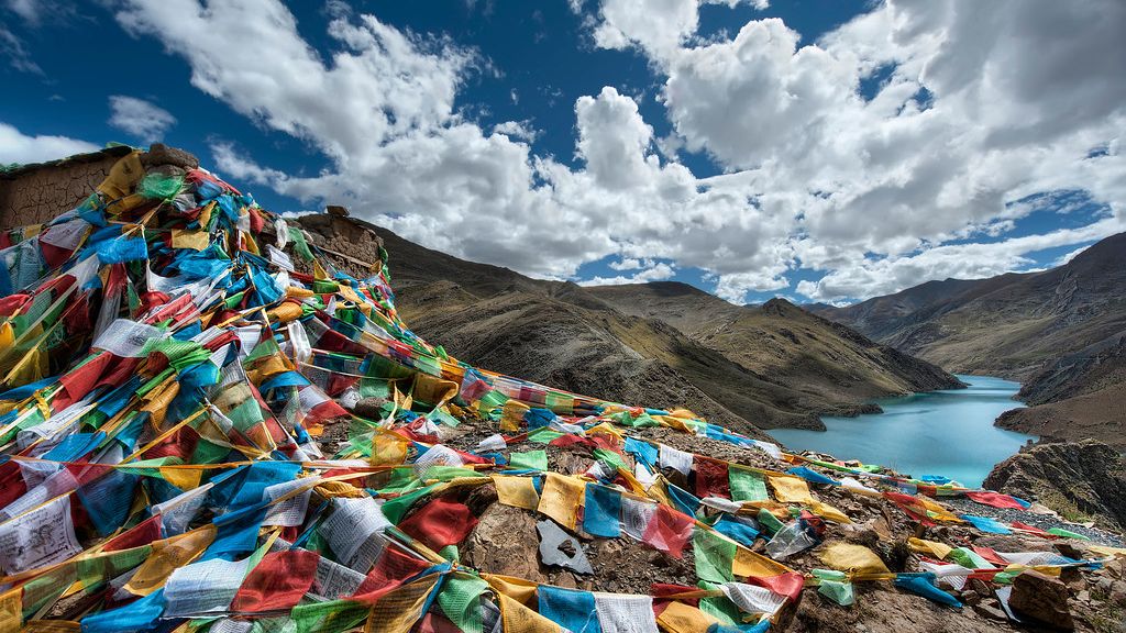 Tibetan Prayer Flags by Pathos Photos is licensed under CC BY-NC-SA 2.0