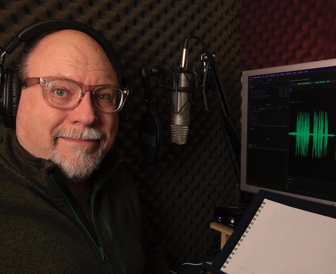 Don Fortner wearing headphones in his studio