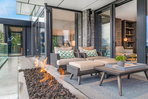 Exterior deck with large open gas fire