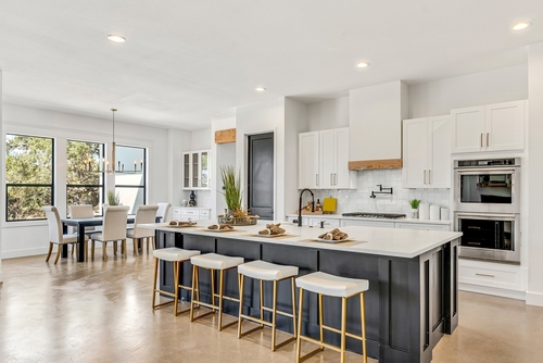 A luxury home kitchen with natural light