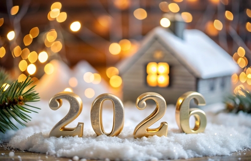 Golden number 2026 and tiny home on background of snow with garland lights