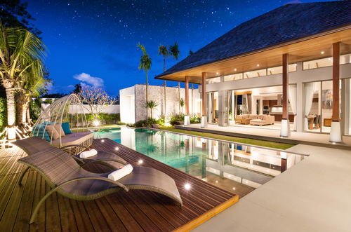 real estate Luxury Interior and exterior design  pool villa with living room  at  night sky  home_ house _sun bed _sofa