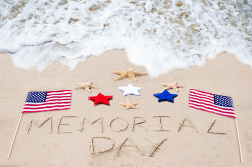 Memorial day background on the sandy beach