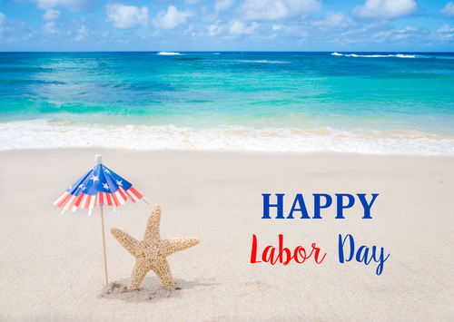 Labor Day USA background with starfishes and decorations on the sandy beach