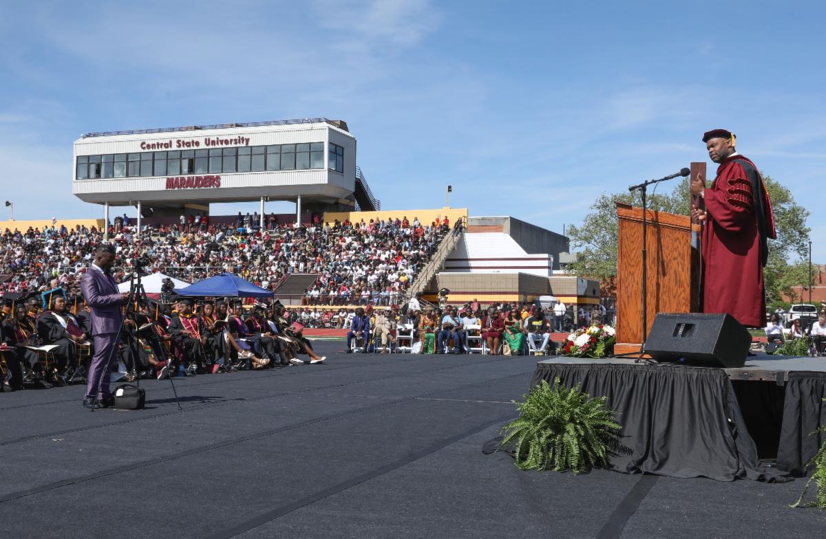 commencement speaker on stage at mcpherson stadium