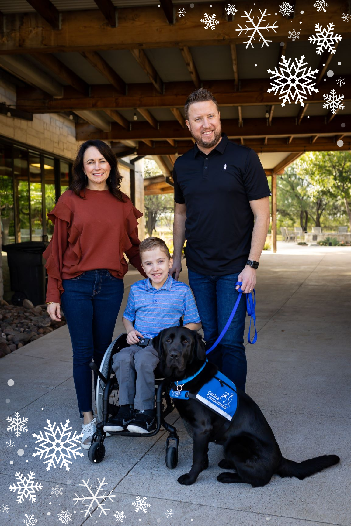 Solomon with his mom, dad and service dog.