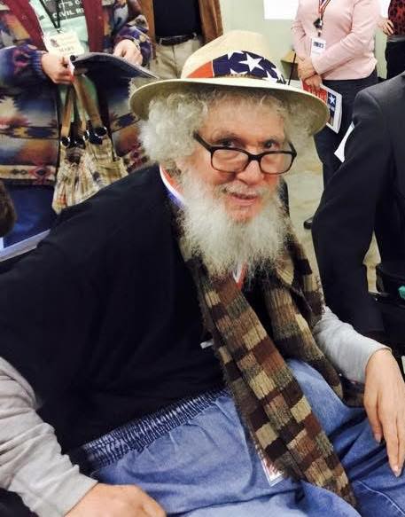 Bob Kafka wearing a brimmed hat with a U.S. flag design.