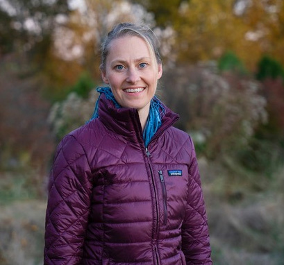 Photo of Dr. Heidi Schreiber-Pan outdoors in a purple jacket