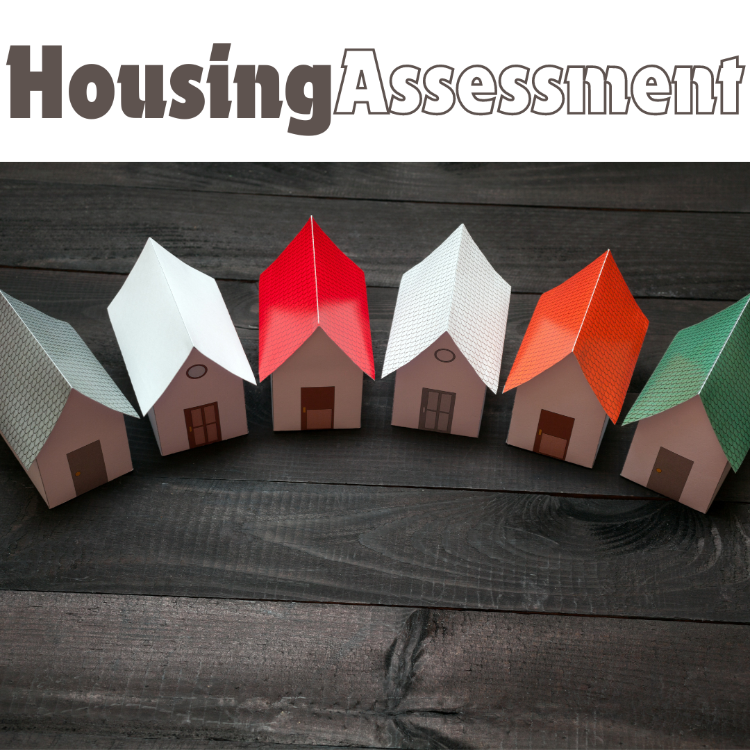 Housing assessment graphic that has paper houses on a wood background