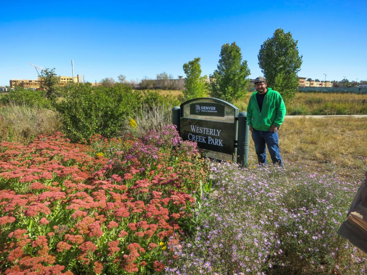 Denver Parks and Rec Rahman at WC sign.jpg