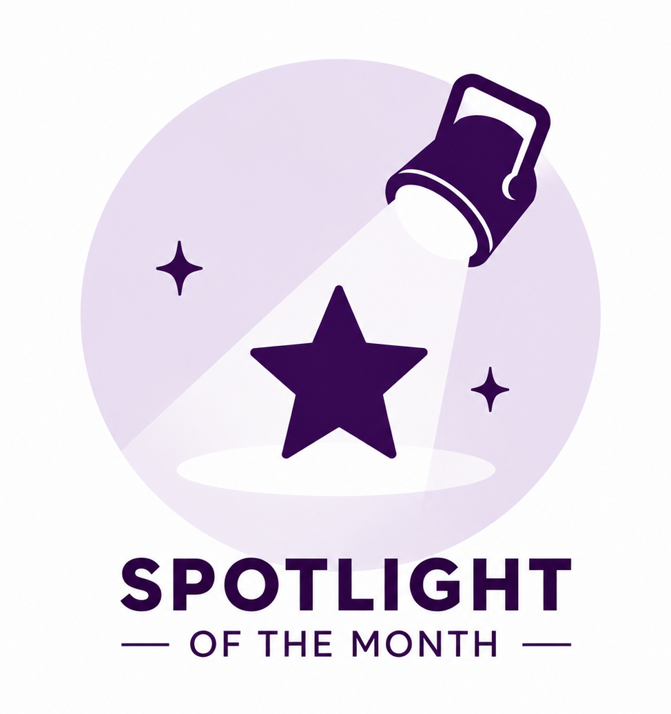 Spotlight of the Month graphic featuring a spotlight shining on a dark star.