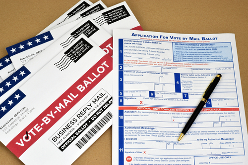 Mockup of Vote by Mail Ballot envelopes and application letter to vote by mail for election.