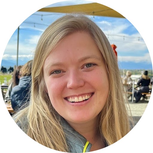 Photo of Erika Iisa. She is smiling and is blonde.