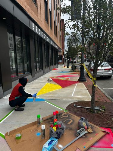 Local Artist Jamaal Bonnette Paints Mural with Black Owned Brockton