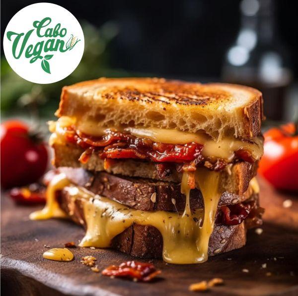 Delectable Grilled Cheese with savory sun dried tomatoes and spinach