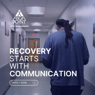 The words recovery starts with communication apply now over the image of someone from behind wearing blue scrubs walking down a hallway