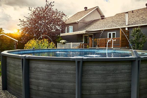 Picture of an above ground pool with a small fountain