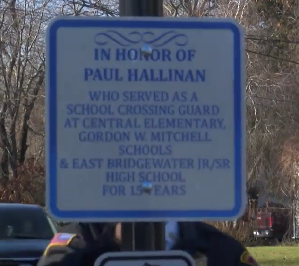 Cross Walk Dedication Ceremonies for Paul Hallinan sign