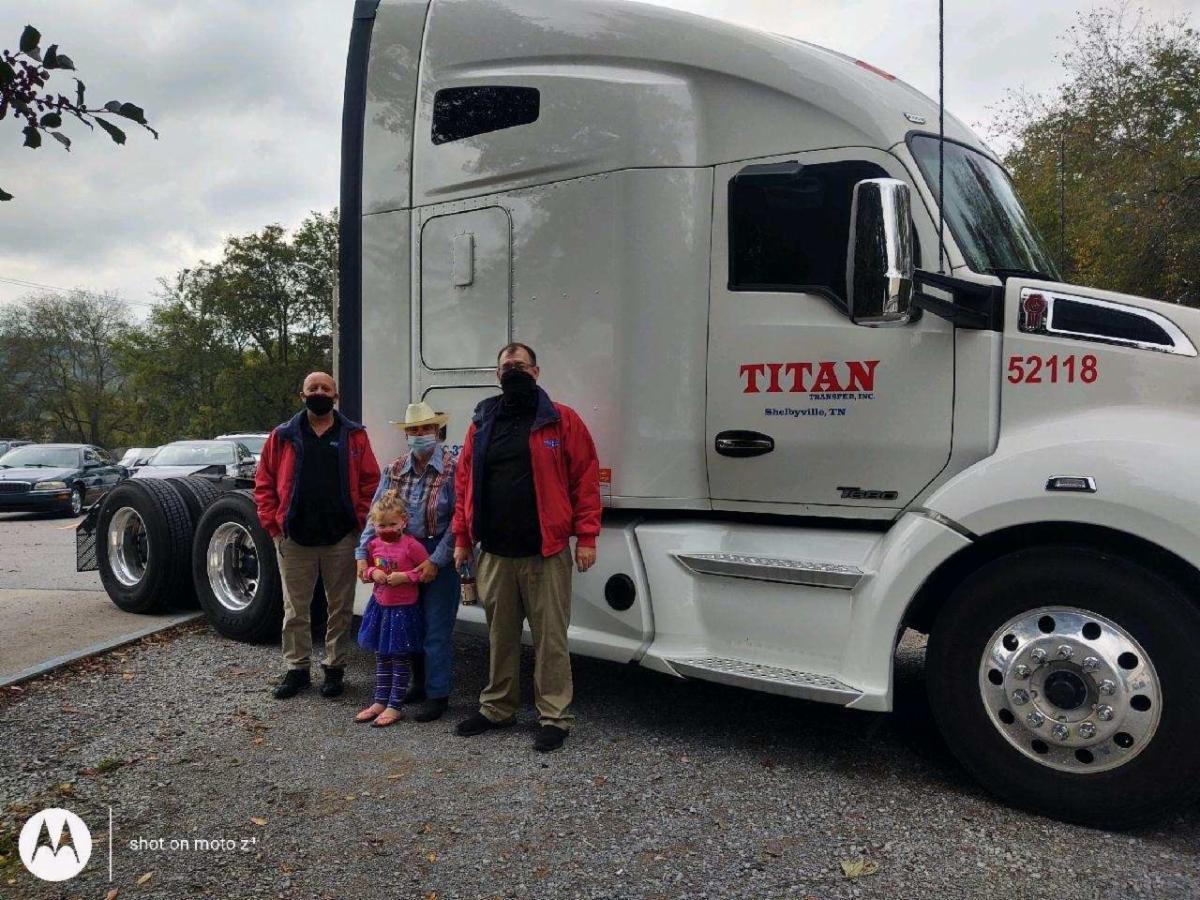 Left and R - Road Team Captains Steve Bowar and Robert Moxley - Titan Transfer.   Middle - Sharon Pragle - Senior Center Director.